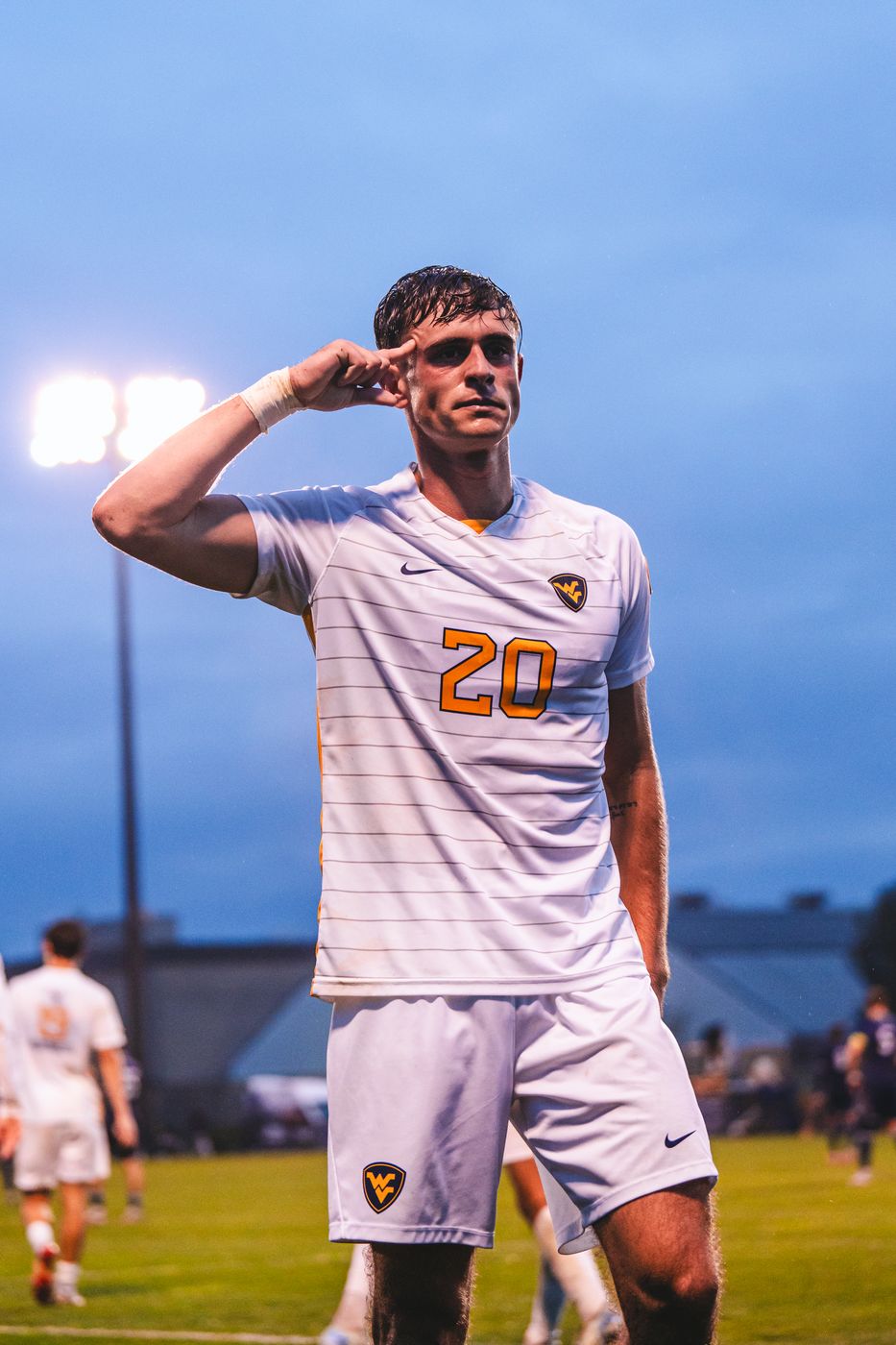 ETURE alumnus in college soccer action