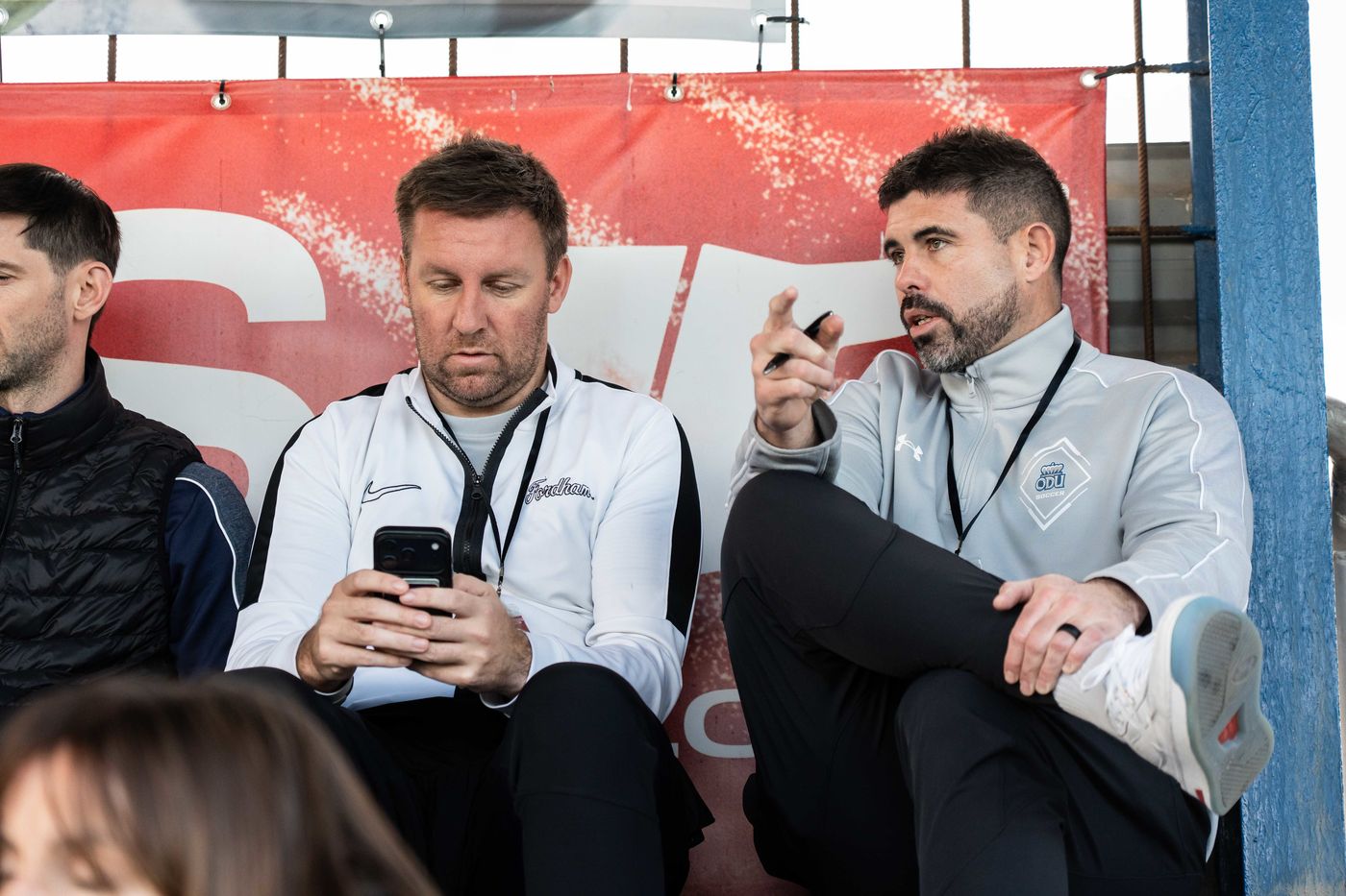 ETURE coaching staff at a match